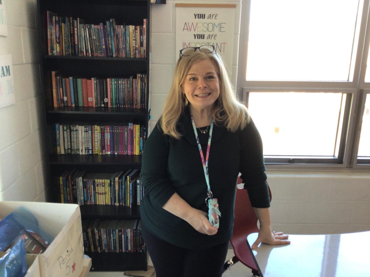 Mrs. Duffy poses for a picture in room 311 at WMS.
