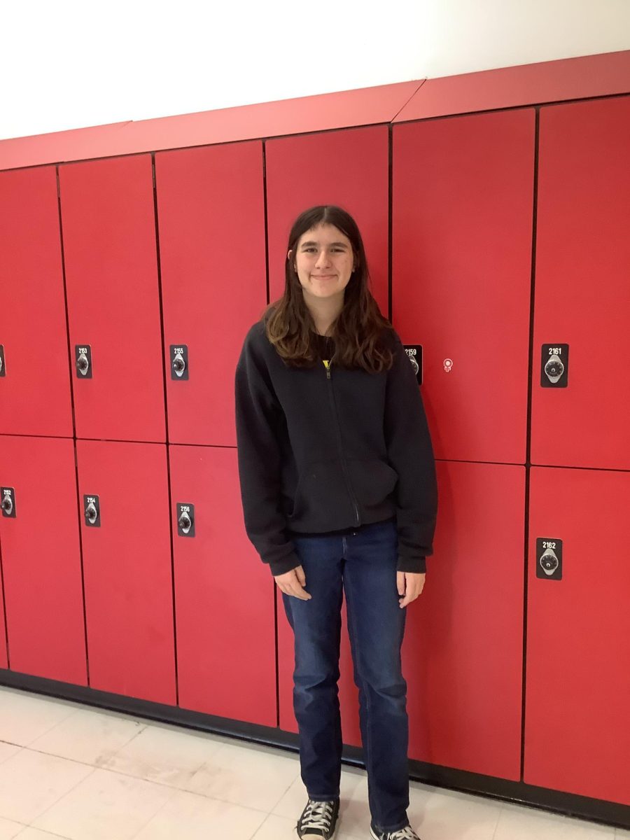 Parker Crea, a 7th grade student at WMS, poses for photo  by the lockers.