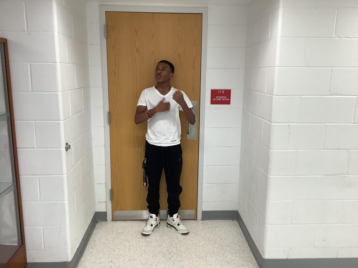 Daryl poses for a picture outside of the gym.