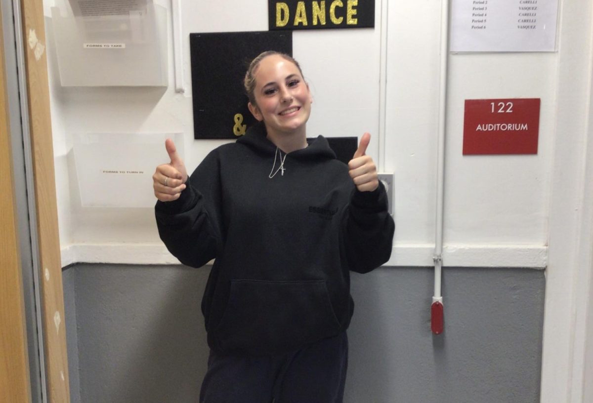 Trista Balash poses outside the auditorium 