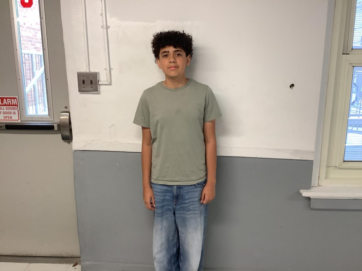 Yaseen Alnashar poses on Wednesday at WMS for a picture.