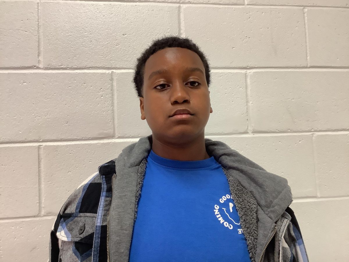 Aaron Dacres is a 7th grader at WMS posing for a picture.