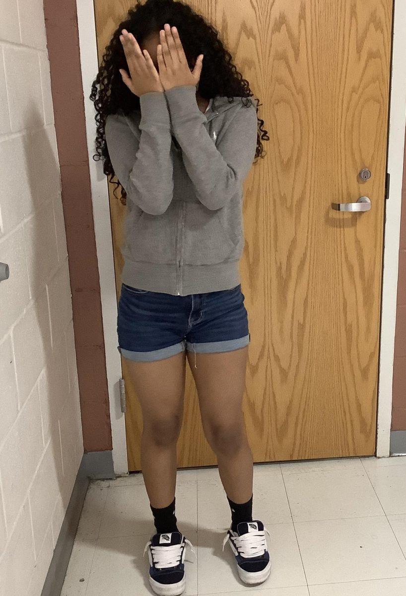 7th grader Nahomi hasting poses for a picture at WMS.