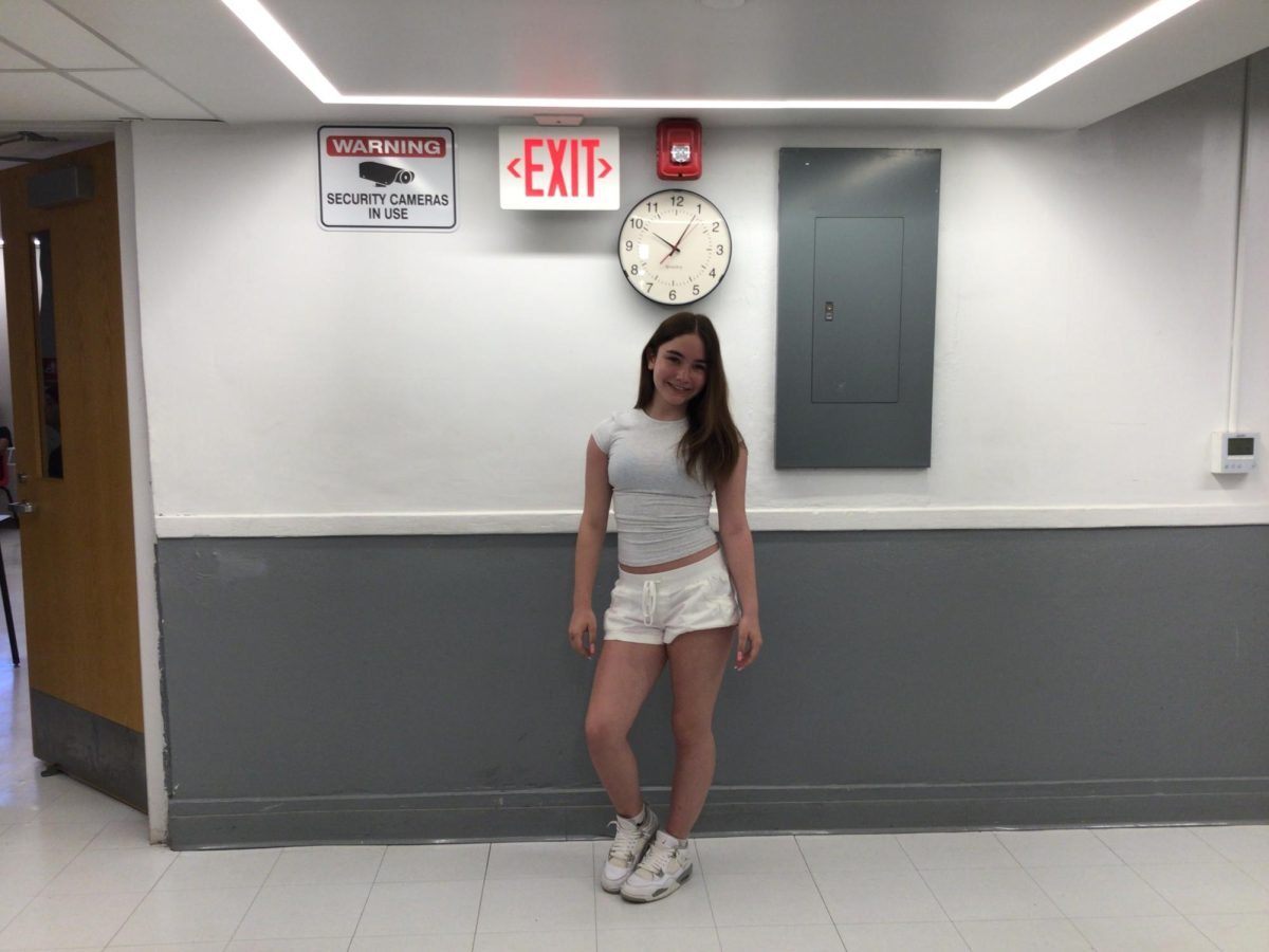 Teala Caverly poses for a photo at  WMS. 